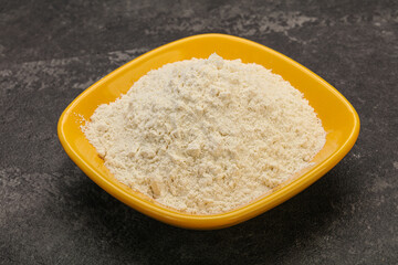 Wheat flour heap in the bowl