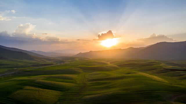 sunrise over the farm hills