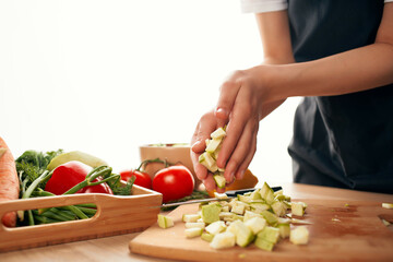 kitchen slicing vegetables for salad healthy eating vitamins