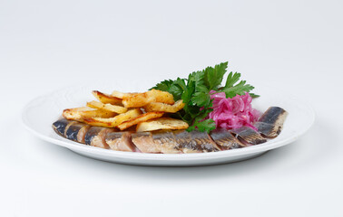 Photo of pickled herring with potato and onion