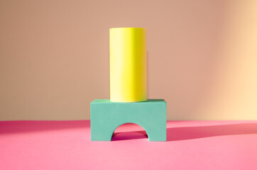 Bright minimalistic abstract background with three-dimensional geometric shapes: cylinders,...