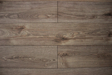 Naklejka premium gray-brown wooden parquet floor for use by design