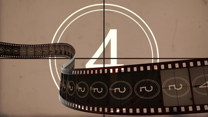 Animated film rolling against retro countdown movie at the cinema hall on the premiere event festival. Film strip reel introduction footage for filmmakers for cinematic filmmaking production intro. - Powered by Adobe