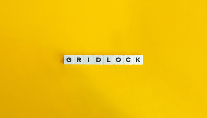 Gridlock banner. Block letters on bright orange background. Minimal aesthetics.