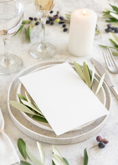 Wedding Table place with a card decorated with olive branches