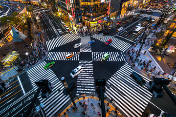 Aerial view of intersection in Ginza, Tokyo, Japan at night.