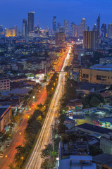 Naklejka na ściany i meble aerial view of bangkok architectures in smart city for technology background. Skyscraper buildings in Bangkok City at night, Thailand 