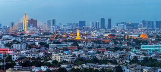 Aerial view of Bangkok City skyline by Chao Phraya River in Thailand.
