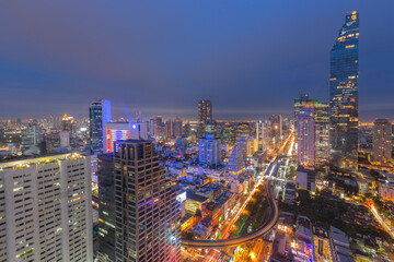 Fototapeta premium Bangkok Cityscape, Business district with high building at dusk (Bangkok, Thailand) 
