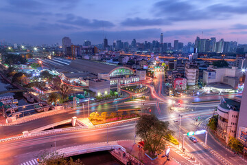 Aerial view of Hua Lamphong Railway Station busy street road. Centre intersection or junction in Bangkok Skyline. Thailand. Financial district center in smart urban city.
