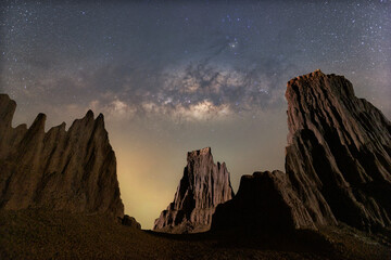 milky way with bright stars on blue sky at night at Lalu  mountain hills, Thailand. Natural...