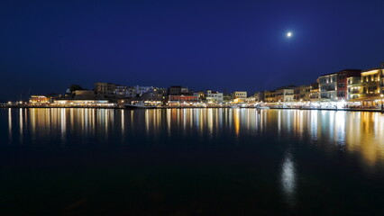Fototapeta na wymiar city skyline at night, Chania in Crete, Greece, starry sky