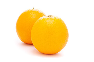 Close-up of Organic Indian Citrus fruit sweet  Seedless kinnow (Kinnow mandarin)  high yield mandarin hybrid, it is yellow in color,  isolated over white background,