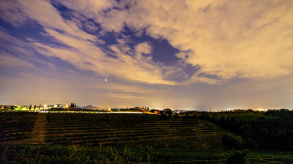Evening in the vineyard of Rosazzo during a moon eclipse
