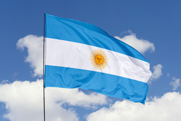 Argentina flag isolated on the blue sky background. close up waving flag of Argentina. flag symbols of Argentina. Concept of Argentina.