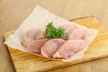 Raw chicken breast slices for cooking