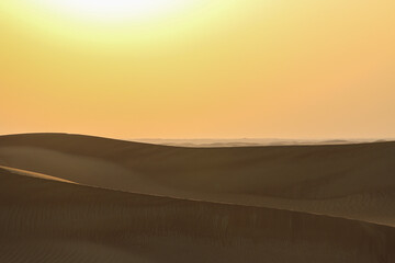 Fototapeta na wymiar Sunset in Dubai desert