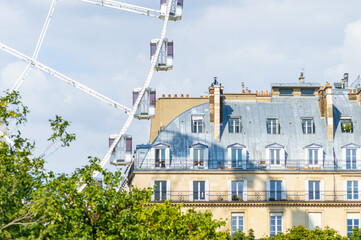Detail of the huge ferris wheel of Place de la Concord in Paris. Here the contrast with the near by buildings