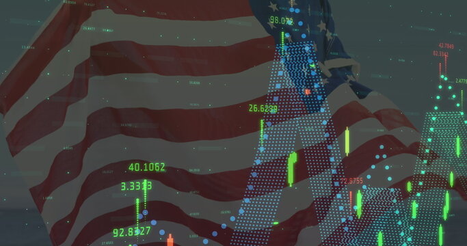 Image of financial data processing over person holding american flag - Powered by Adobe