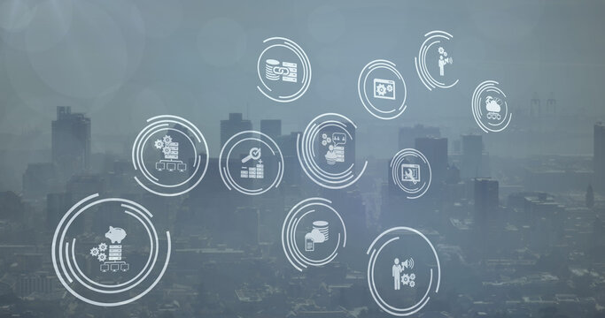 Digital composition of multiple digital icons against aerial view of cityscape