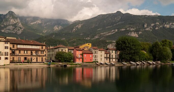 Landscape panoramic view hyper lapse of Pescarenico Village on Adda river close to Lake Como.