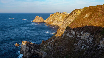 Rocky coast of Asturias at Cabo Peñas at sunset 