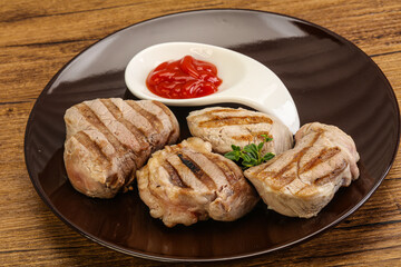Grilled pork tenderlion with tomato sauce