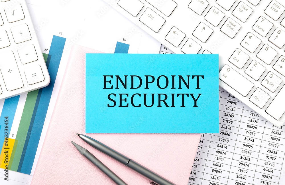Poster endpoint security text on blue sticker on chart with calculator and keyboard,business concept
