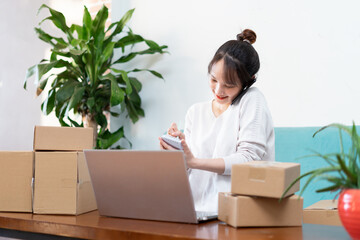 Asian woman portrait at home and online business