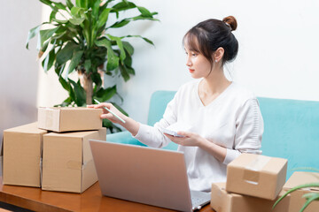Asian woman portrait at home and online business