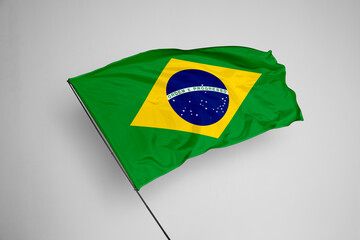 Brazil flag isolated on white background. close up waving flag of Brazil. flag symbols of Brazil. Concept of Brazil.