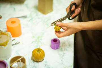 process of making a pumpkin candle for Halloween, Memorial Day Halloween concept