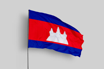 Cambodia flag isolated on the blue sky background. close up waving flag of Cambodia. flag symbols of Cambodia. Concept of Cambodia.