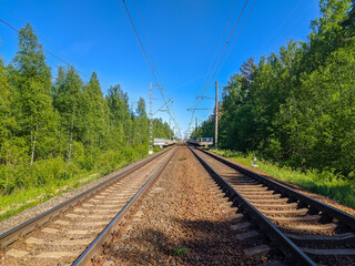 Obraz na płótnie Canvas View of railway tracks in Saint-Petersburg suburbs.