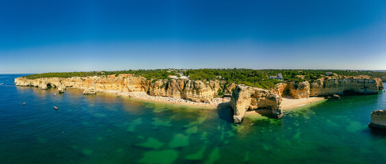 Fototapeta na wymiar Aerial views of Praia da Marinha and Malhada do Baraco - beaches in Algarve, Portugal