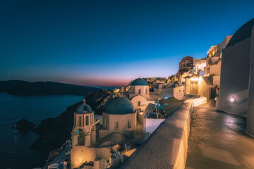 Sunset landscapes of the village Oia in Santorini Island in Greece