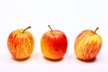 Three ripe eating apples isolated on a white background