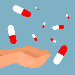 pills falling into the hands with blue background
