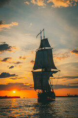 The Frigate Shtandar in calm weather sailing sunset time Riga Latvia