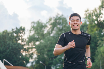 Fototapeta premium Athletic young man running in the nature.