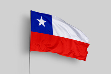 Chile flag isolated on the blue sky background. close up waving flag of Chile. flag symbols of Chile. Concept of Chile.