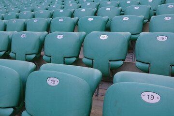 Empty seats in the stadium due to coronavirus. Banning sporting events due to lockdown. Distribution of Covid-19.