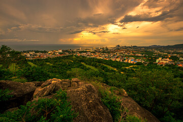 The view of the natural background of the mountain close-up, with blurred fog scattered in the rainy season or the humid climate, with beautiful green trees in the ecological system