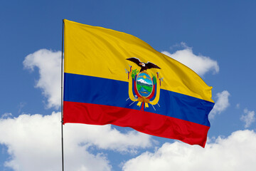 Ecuador flag isolated on the blue sky background. close up waving flag of Ecuador. flag symbols of Ecuador. Concept of Ecuador.