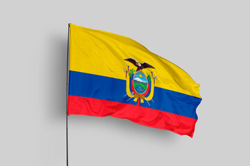 Ecuador flag isolated on the blue sky background. close up waving flag of Ecuador. flag symbols of Ecuador. Concept of Ecuador.