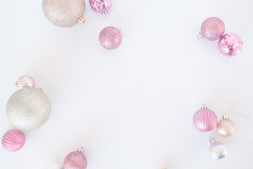 pink  Christmas decoration sferes and white background