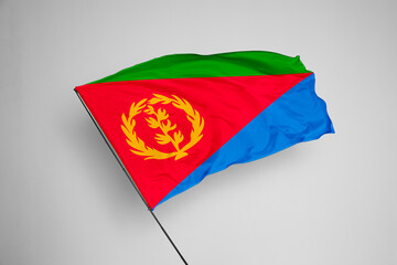 Eritrea flag isolated on white background. close up waving flag of Eritrea. flag symbols of Eritrea. Concept of Eritrea.