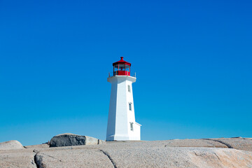 Fototapeta na wymiar Lighthouse at Peggys Cove in Nova Scotia, Canada