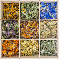 Mix from dried flowers in a wooden box
