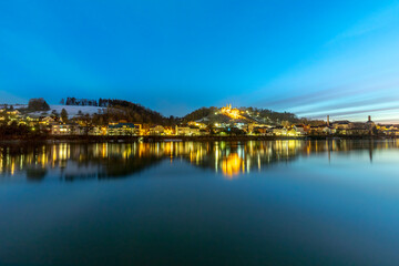 Plakat river inn view at Passau in Bavaria with reflection of promenade by night
